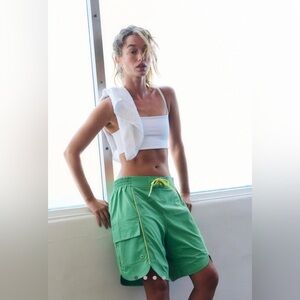 Free people movement rip tide outlander shorts in field goal with yellow pop